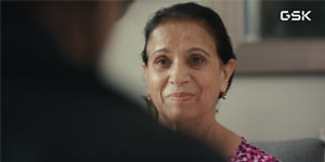 woman looking towards camera.