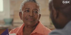woman  looking towards  camera.